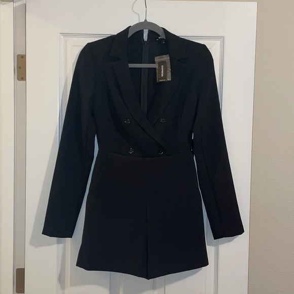 Express Pants - Black Romper suit. Never worn it just tried it on. 95% Polyester 5% Spandex.
